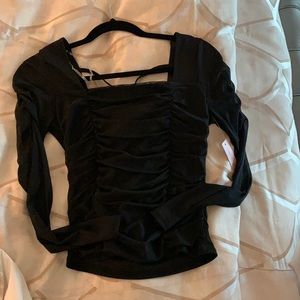 Black dress up or dress down top.